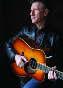 Lyle Lovett Lyle Lovett holding a guitar