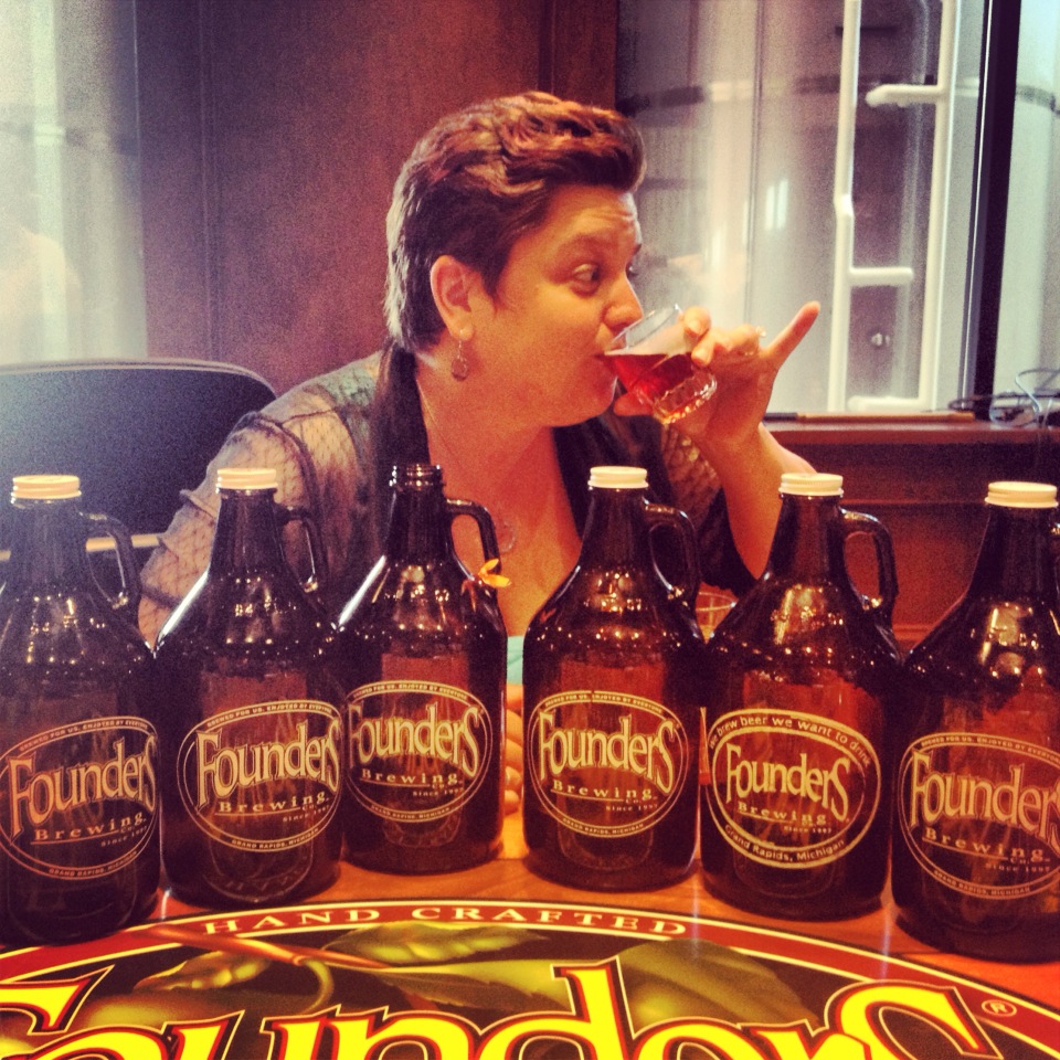 Jenna from Amore Trattoria sipping a Founders Brew.