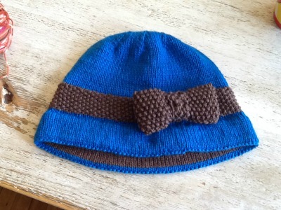 This Flapper-style hat is January's Taste of Nomad project. This Flapper-style hat is January's Taste of Nomad project at Nomad Yarns in Plainfield, Indiana