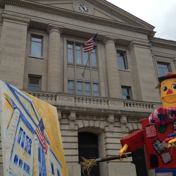 I love that this scarecrow is painting a picture of the very courthouse it stands in front of. Scarecrow Festival, Danville, Indiana