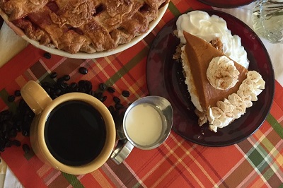 The pumpkin creations at Bread Basket Cafe & Bakery are amazing. Pumpkin pie with coffee at Bread Basket Cafe & Bakery in Danville, Indiana