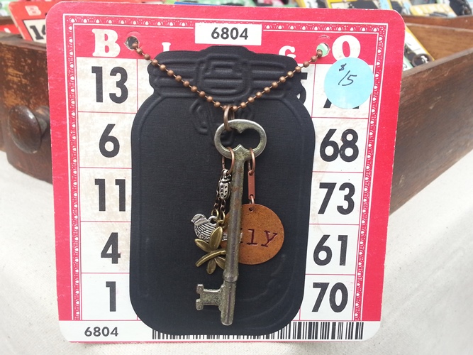 Skeleton key necklaces featuring Bingo cards from Joanie's Junque. Joanie's Junque at Handmade Market in Danville, Indiana