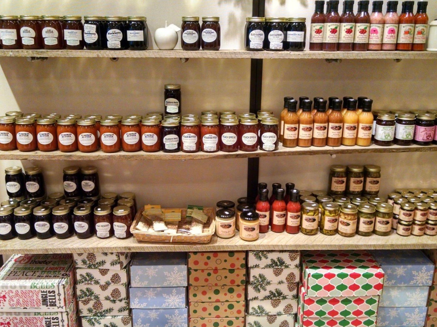 Pick a gift box, like the ones at the bottom of this photo, and fill it with all sorts of goodies for a unique, local Christmas gift. Pick a gift box, like the ones at the bottom of this photo, and fill it with all sorts of goodies for a unique, local Christmas gift.