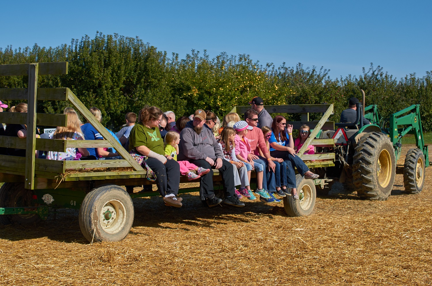 The hayride to the pumpkin patch has become a family tradition. Hayride at Beasley's Orchard Heartland Apple Festival in Danville, Indiana