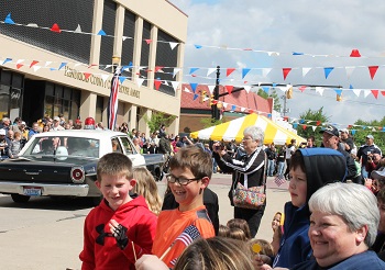 When you think about travel, what comes to mind? How about sharing laughs with loved ones during a parade? Mayberry in the Midwest festival parade, Danville, Indiana