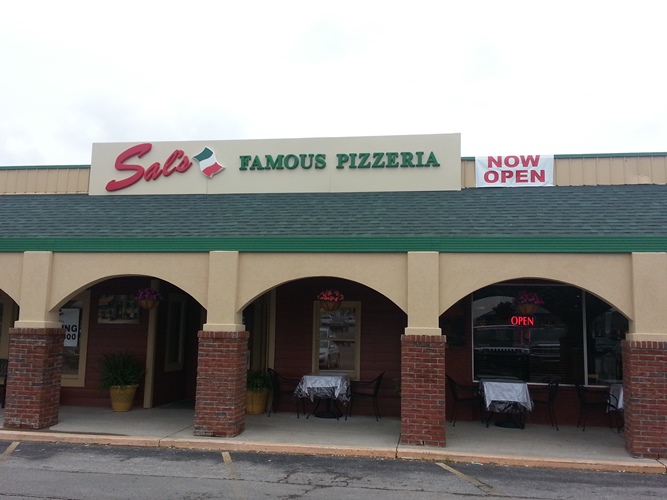 Sal's Famous Pizzeria's newly remodeled exterior added an awning and some outdoor seating. Sal's Famous Pizzeria, Brownsburg, Indiana