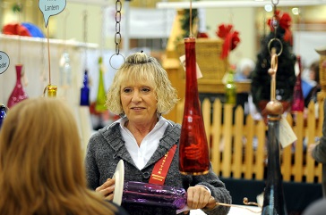 Hand-blown glass items are a popular choice at the Gingerbread Christmas sale. gingerbread christmas glass vendor