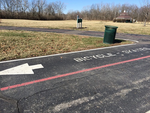 Handy lane and directional guides on the paved trails making running and biking easier and safer. Running and biking lanes on Hummel Park paved trails in Plainfield, Indiana