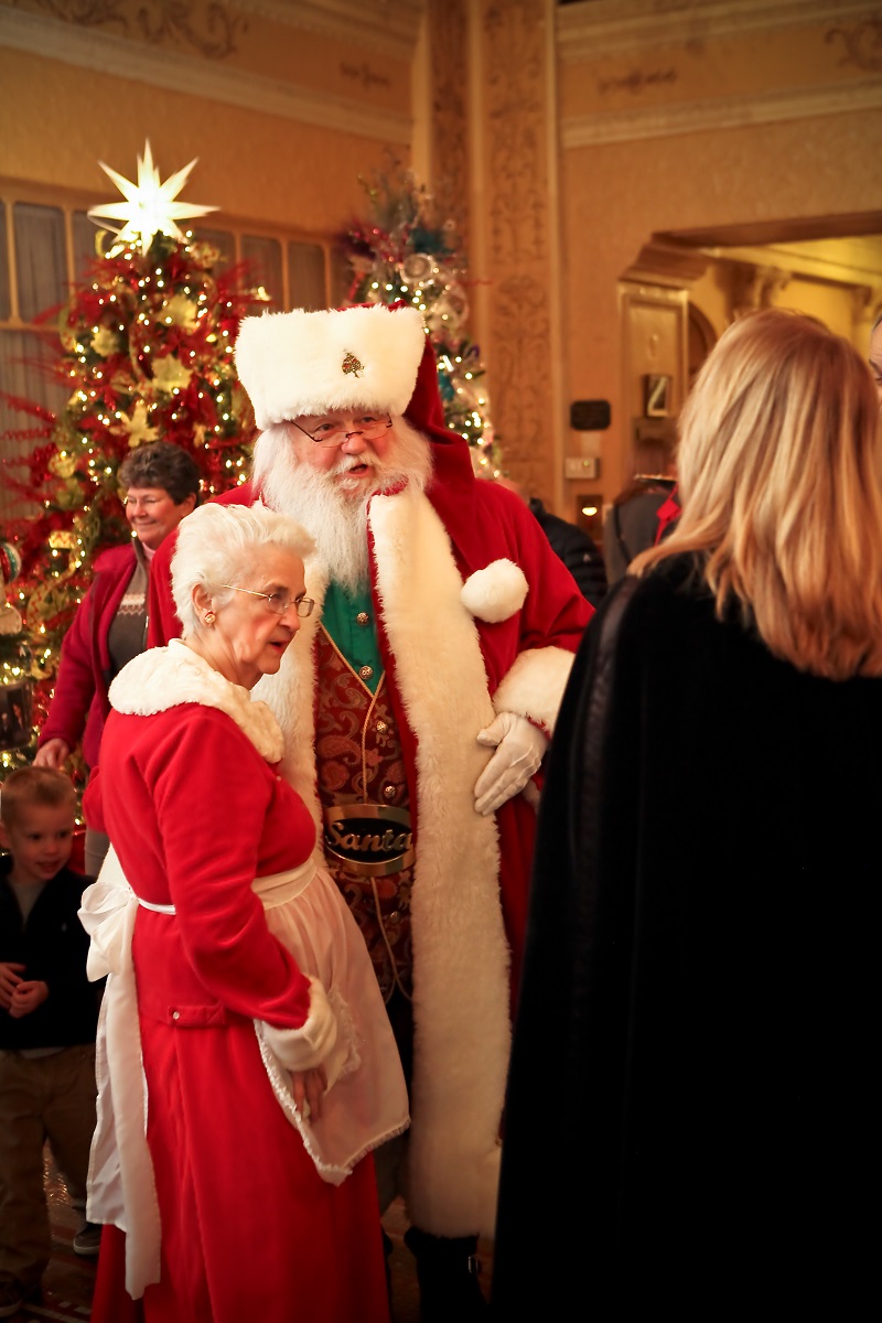 Mr. and Mrs. Claus greet visitors to the Festival of Trees