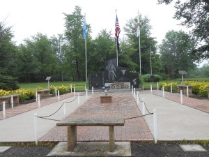 Although it is weather-worn, this memorial is still impressive for the number of detailed etchings it has.