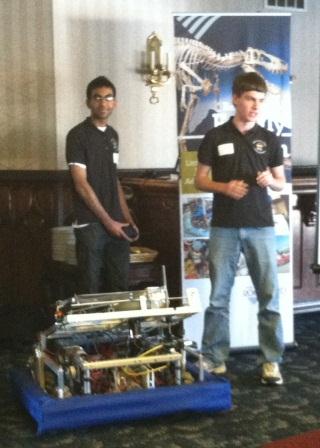 Flaming Monkeys robotics students demonstrate their robot for the Ultimate Ascent robotics
