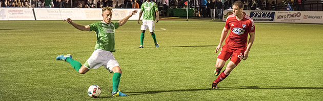 Energy FC player preparing to kick the ball