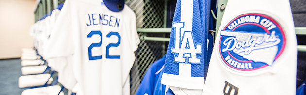 Image of the Oklahoma City Dodgers Locker Room with jerseys hanging up.
