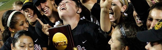 Image of softball players celebrating after winning.