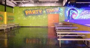 You can now see the skating floor from the party room.