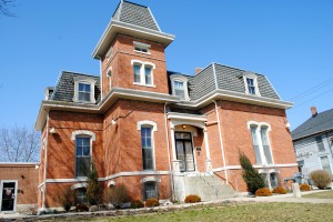 The current site of the Hendricks County Historical Museum used to house the county sheriff, his family, and the county jail.