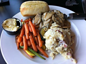 Steak Susan, served with smashed potatoes and vegetables.