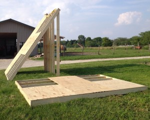 The wall obstacle being built for the first Mud Soap Run.