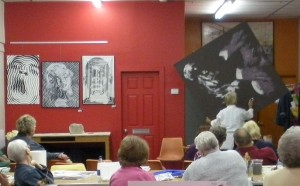 An artist demonstration at Gallery on the Square in Danville.