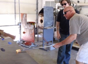 Mark Bellucci shapes his glass, which eventually became a beautiful paperweight at Hot Blown Glass.