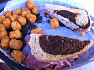 Reuben sandwich and a side of tater tots