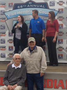 A.J. Watson (seated at bottom during pre-race ceremonies), a USAC Hall of Fame inductee, was last year's Visit Hendricks County Night Before the 500 Grand Marshal. Will you be on that stage this year?