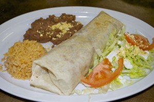 J's Burrito with refried pinto beans, rice and salad.