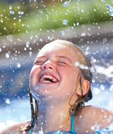 girl coming out of water