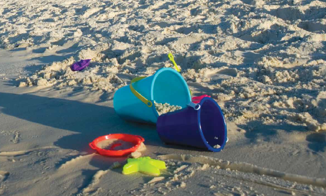 Bucket in sand