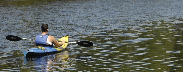 Guy in Kayak on the water