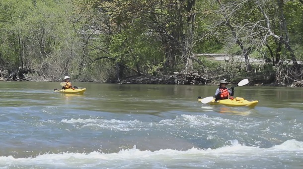 Two kayaks in the water