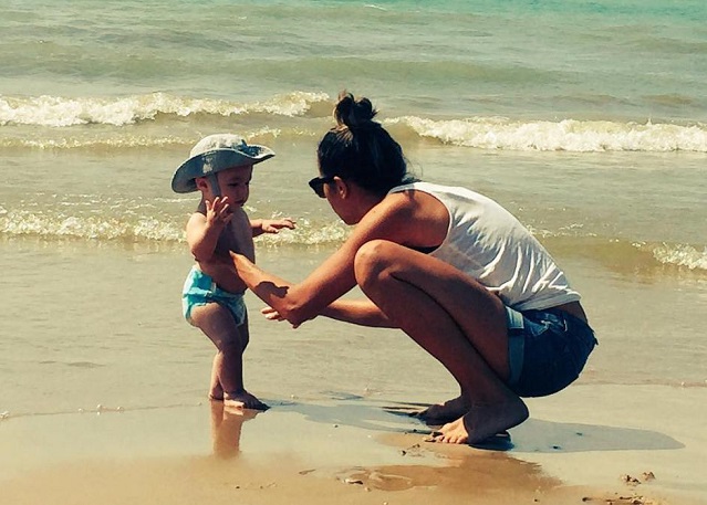 Mom and baby on beach