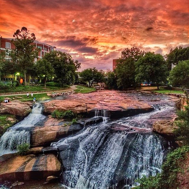 Greenville's downtown masterpiece. #southcarolina #yeahTHATgreenville #sunset #waterfall #skyonfire