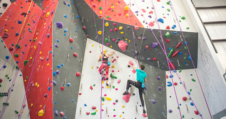 Climbers on the wall at Bliss Climbing Complete