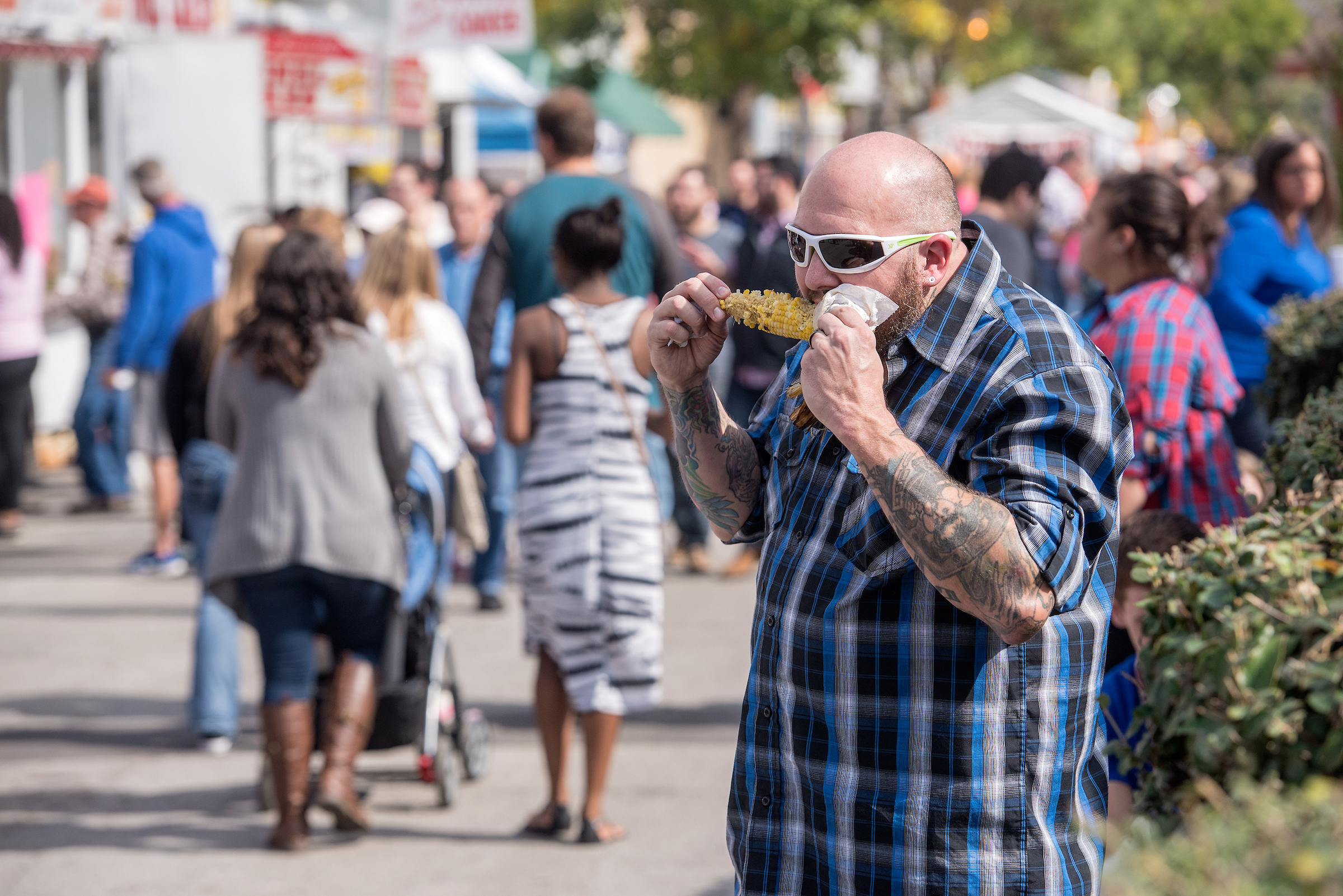 Eating corn on the cob at Harvest Homecoming