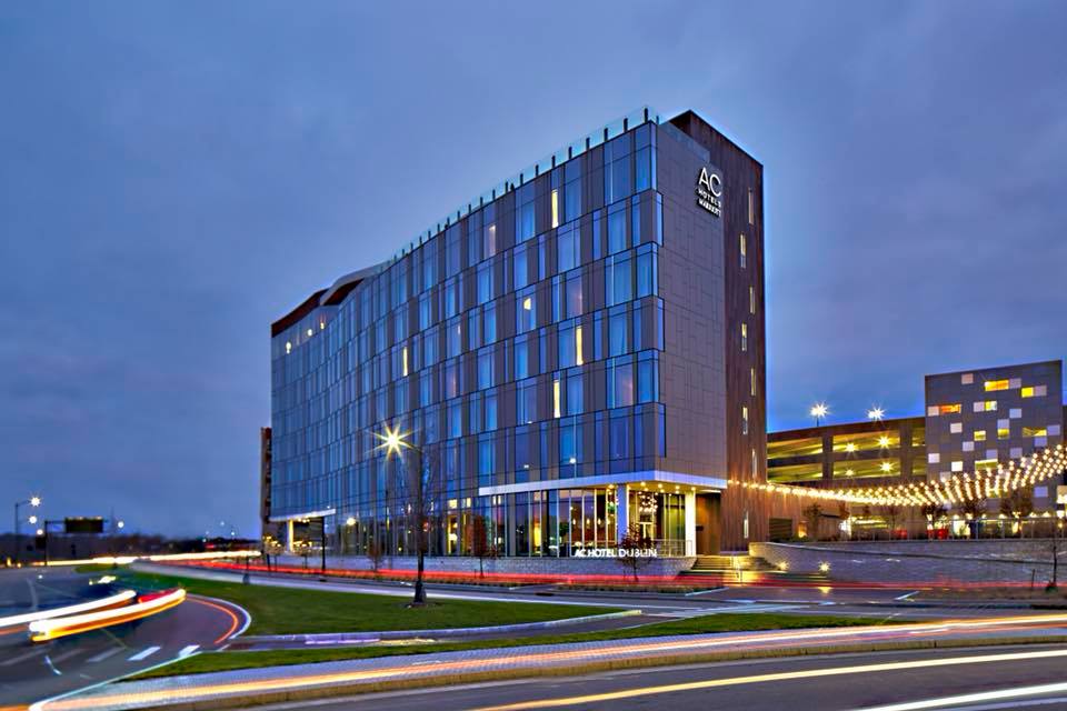 Exterior of the AC Marriott Dublin at night.