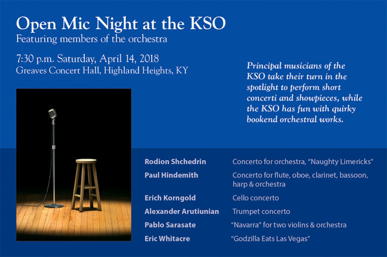 A blue poster with information for the KSO's Open Mic Night and a photo of a microphone and empty wood stool