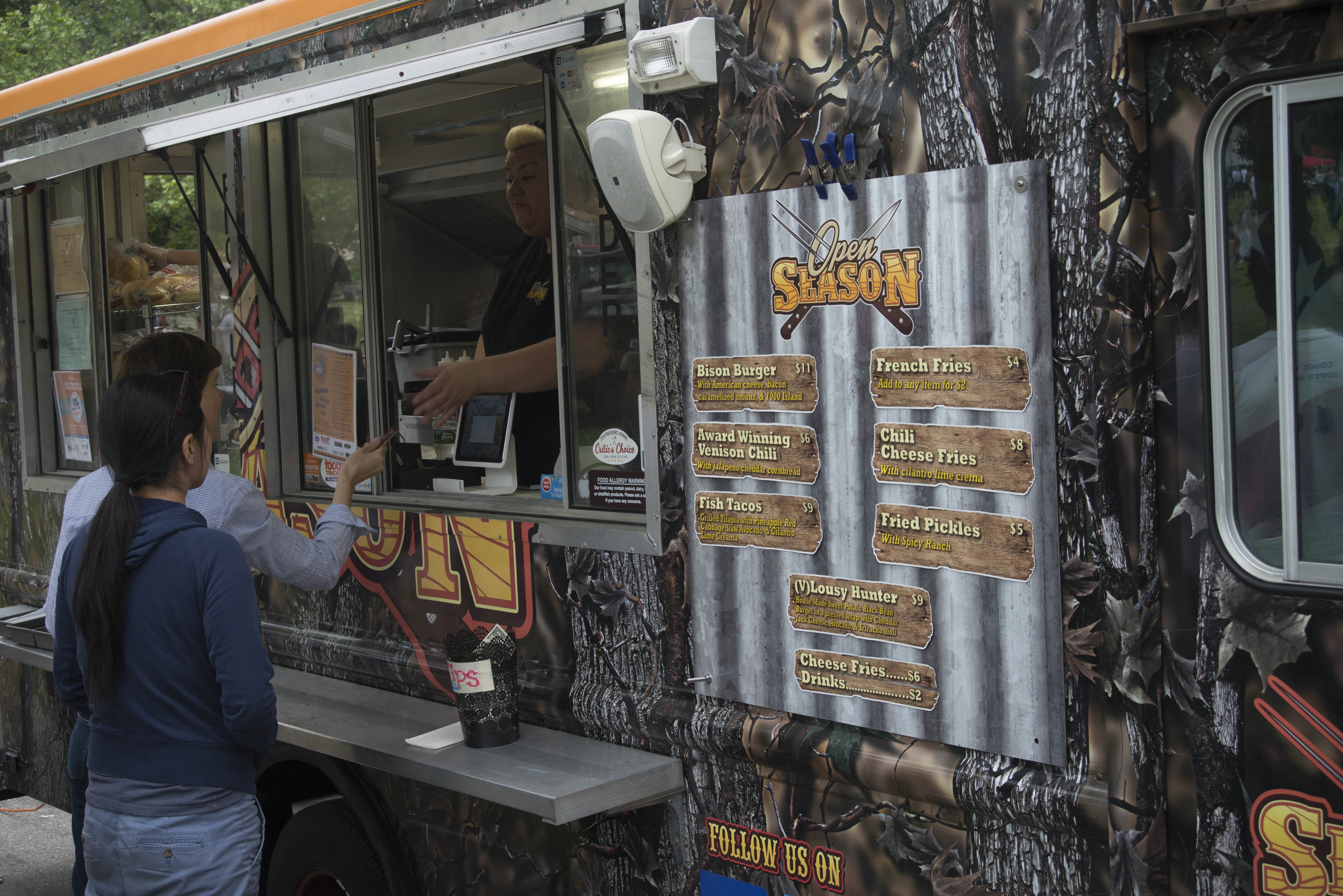 Couple orders food at PVDfest Food Village food truck