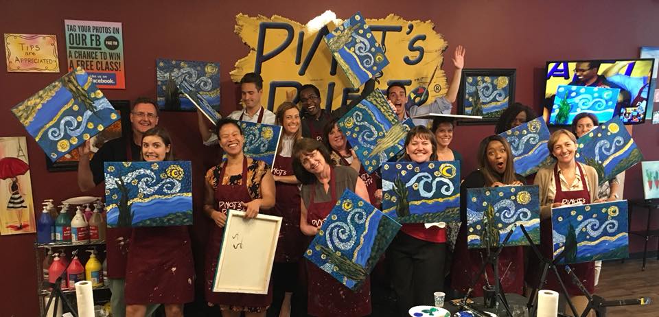 People Holding Up Their Artwork at Pinot's Pallete