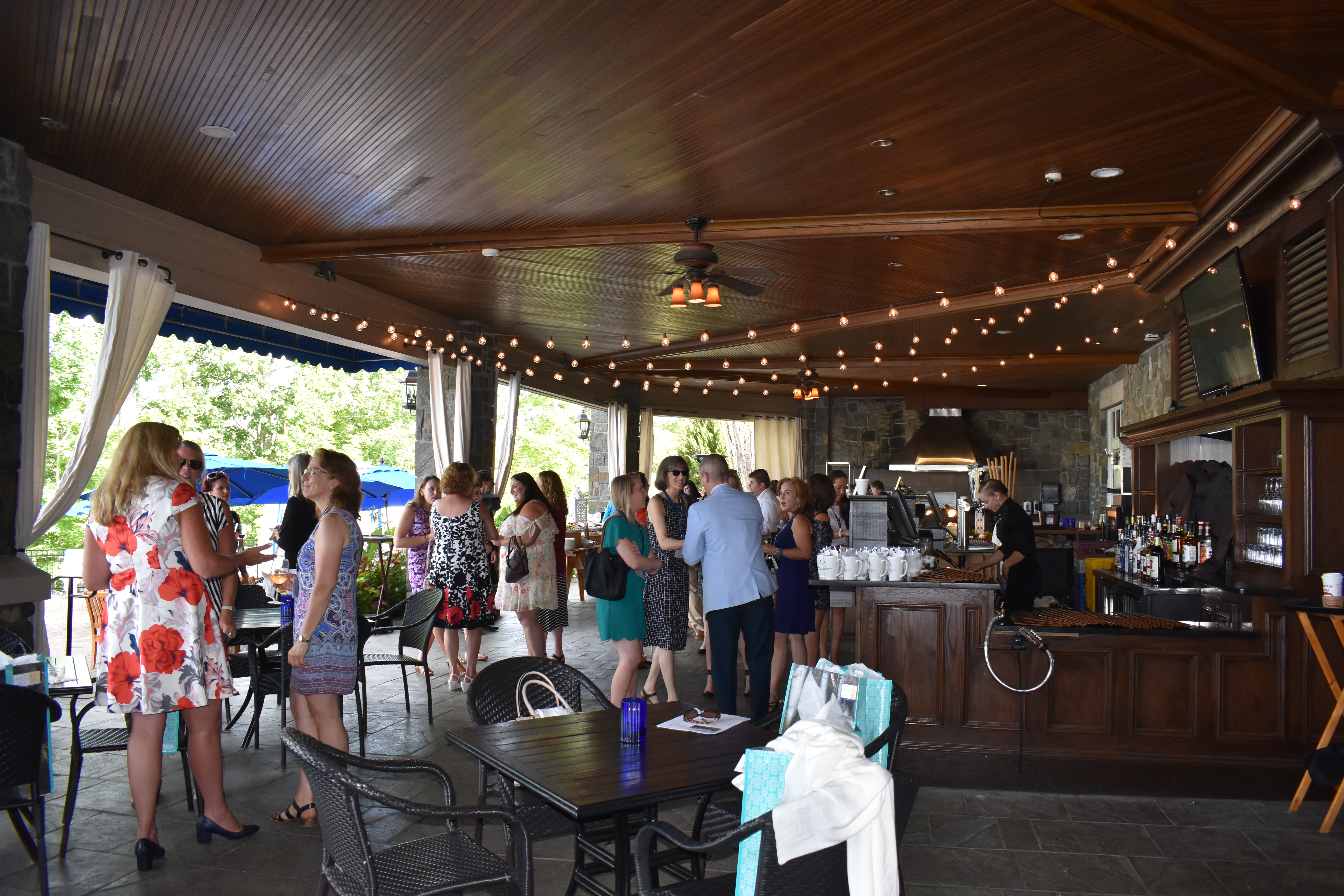 Group networking at the Saratoga National Golf Club patio