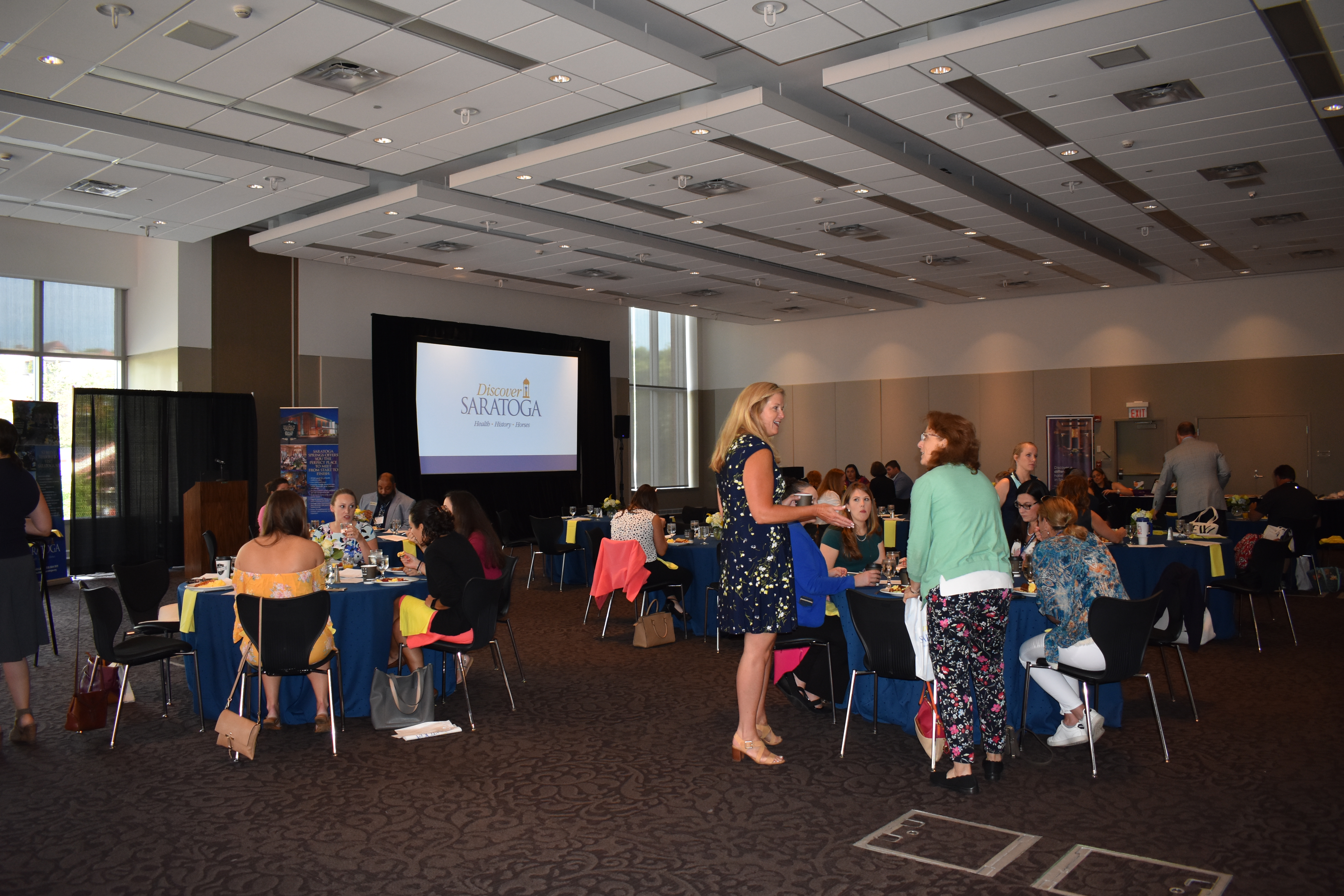 Group sitting for Discover Saratoga presentation at Saratoga Springs City Center