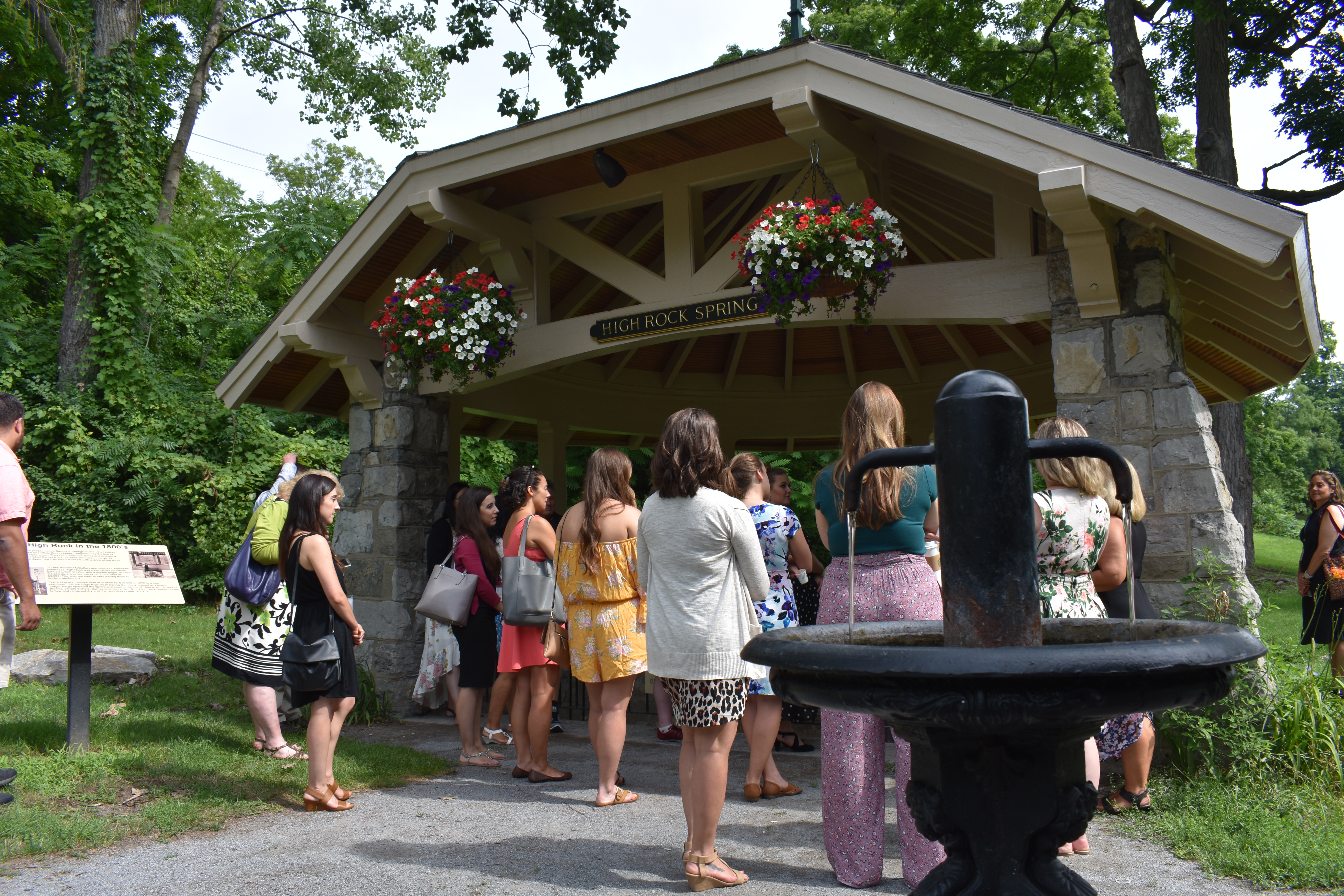 Group circled around High Rock Spring in Saratoga during tour