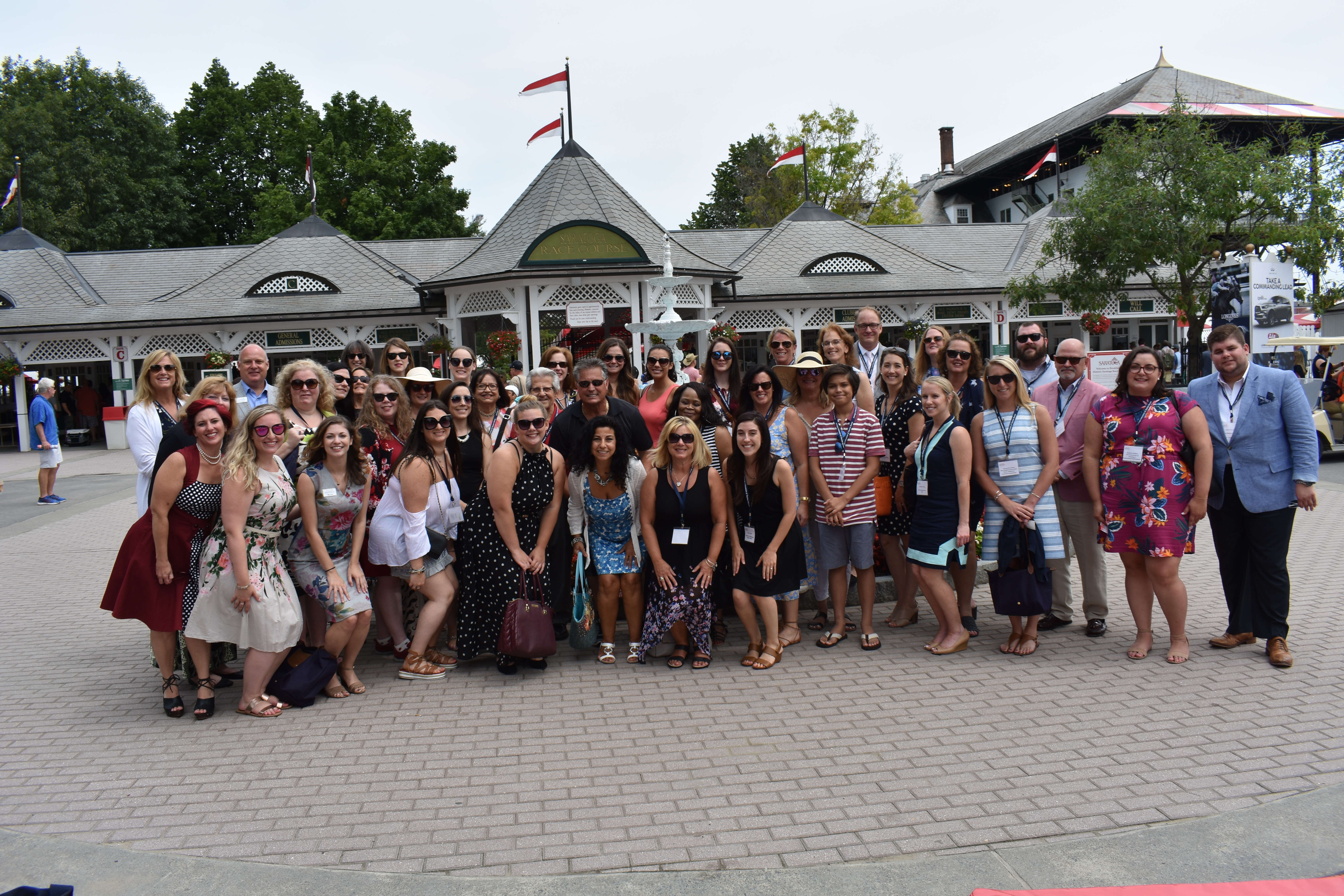 Group standing outside Saratoga Race Course entrance