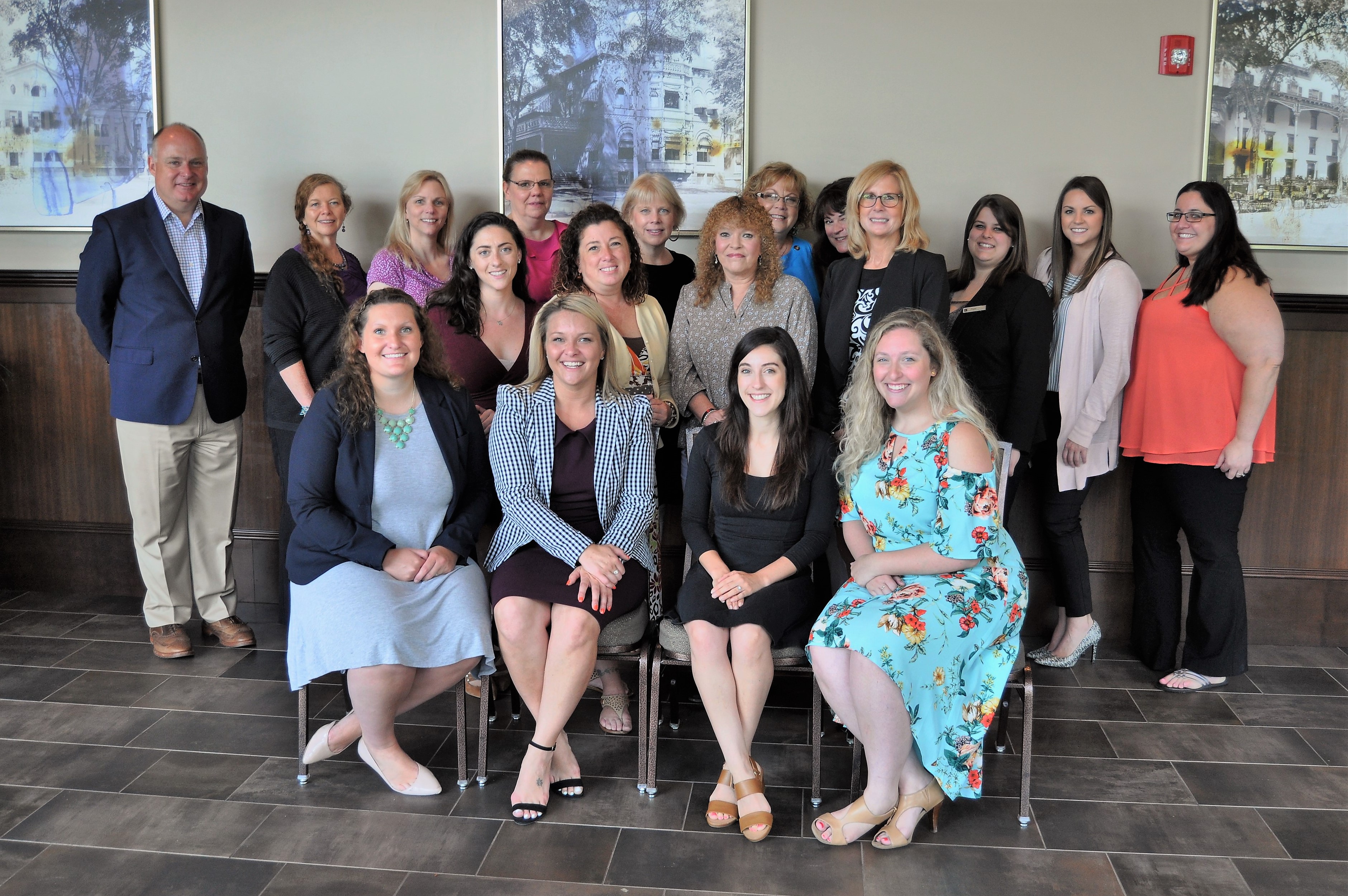 Posed group photo of attendees at Event Services thank you breakfast