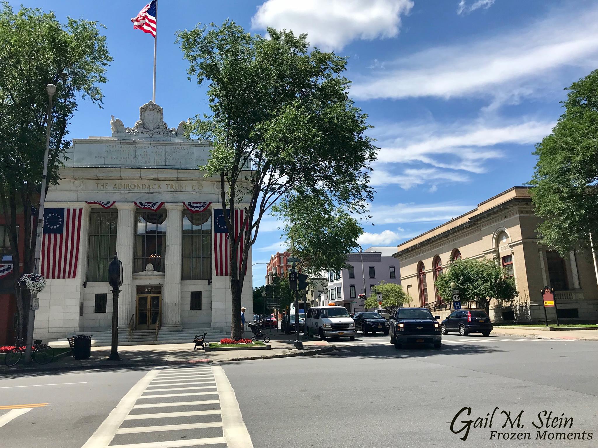 Adirondack Trust on Broadway with its flag.