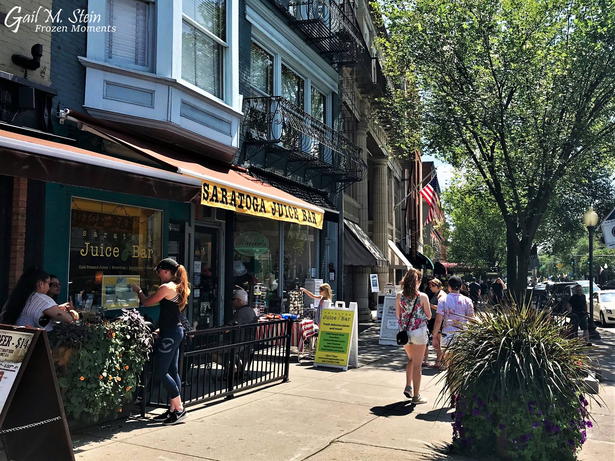 Yellow awning of Saratoga Juice along Broadway