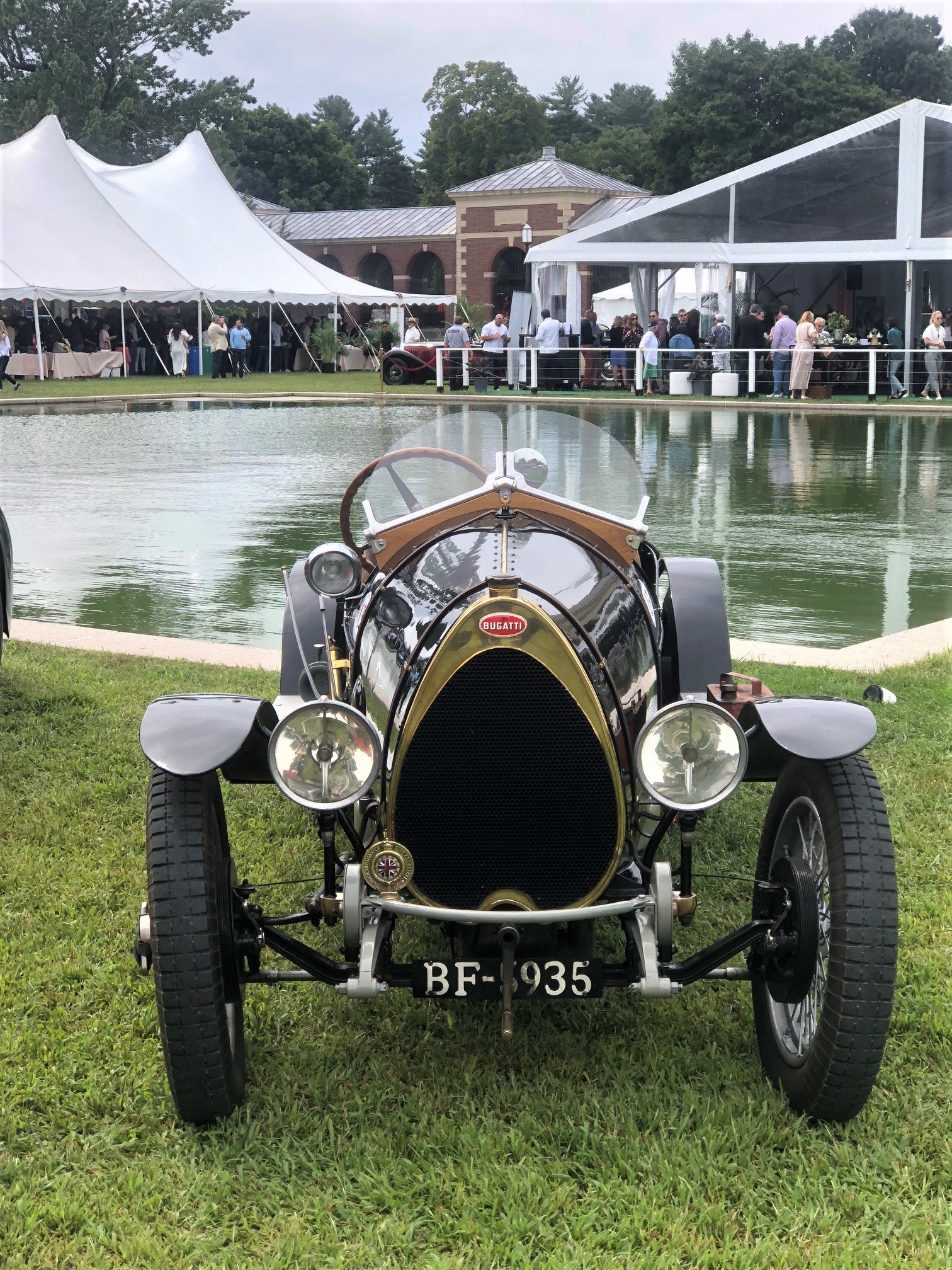 Single car by reflecting pool