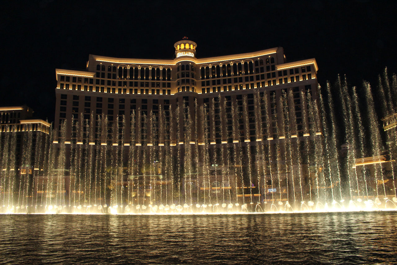 Tourists walk past a Louis Vuitton shop at the Bellagio hotel and News  Photo - Getty Images