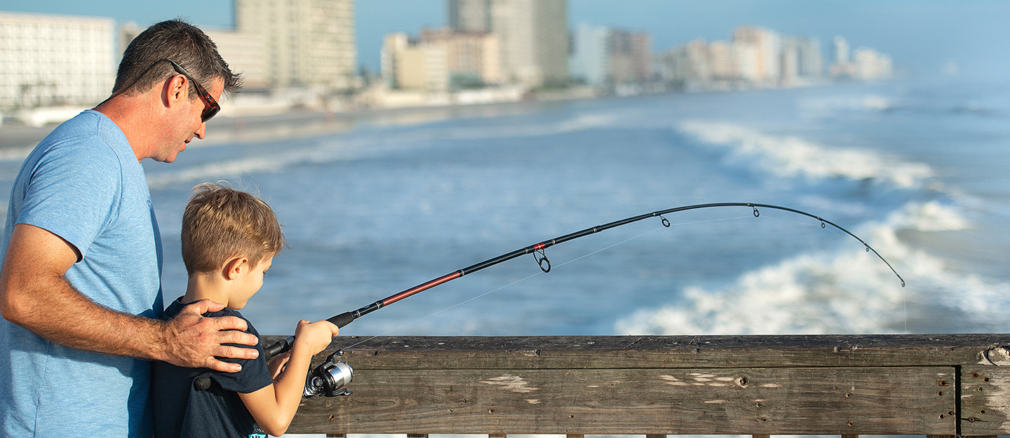 Sitting and Surf Fishing at Daytona Beach Editorial Stock Photo