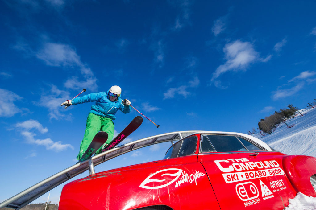 Freestyle skiing on a blue sky day in Michigan.